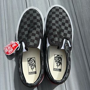Brand new checkered vans slip ons mens 7 women’s 8.5